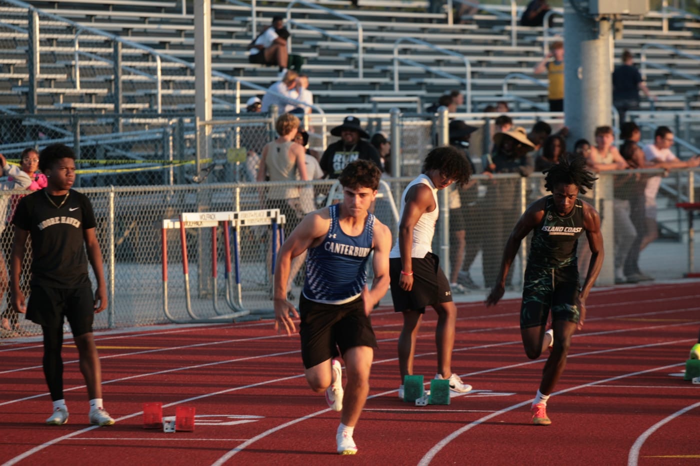 Stephan in a Canterbury jersey launching off the blocks at a track meet